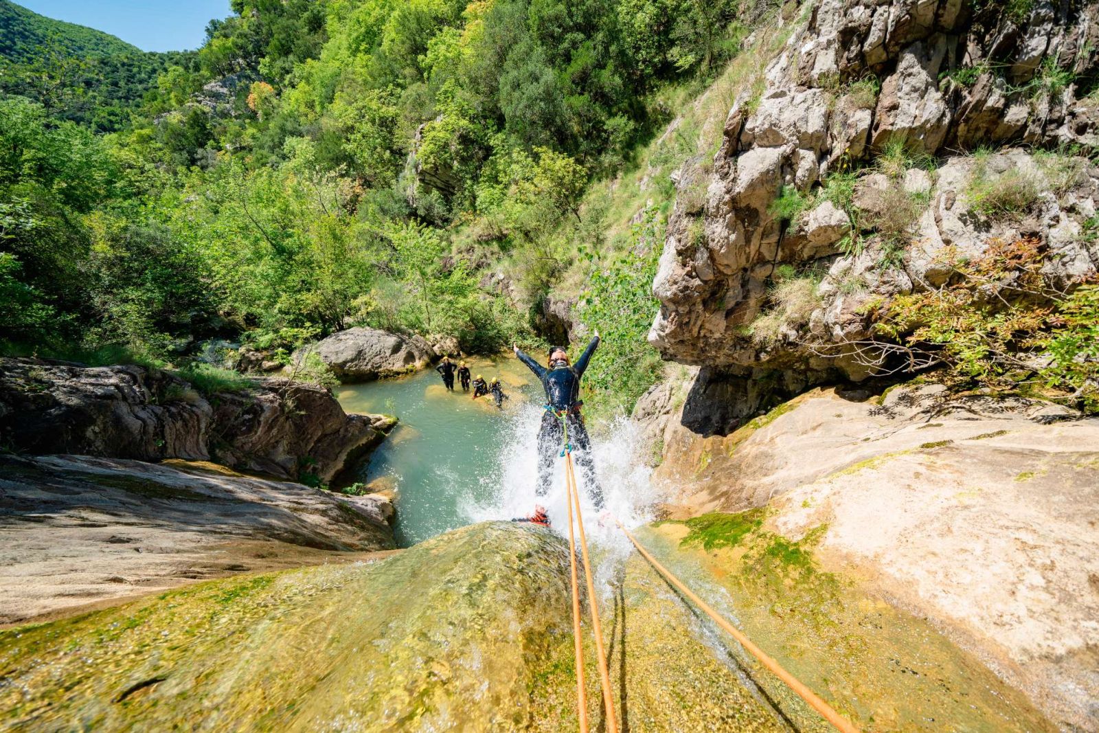 Guest sliding down the natural water toboggan