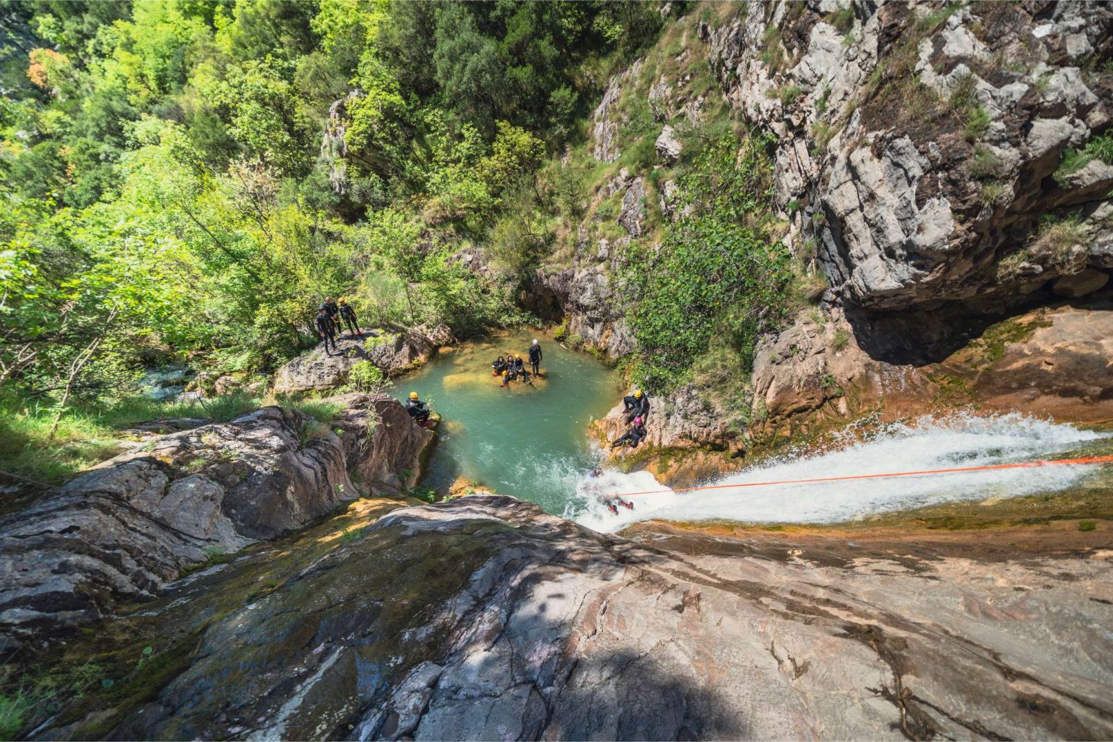 Clear pool reflecting the canyon wall