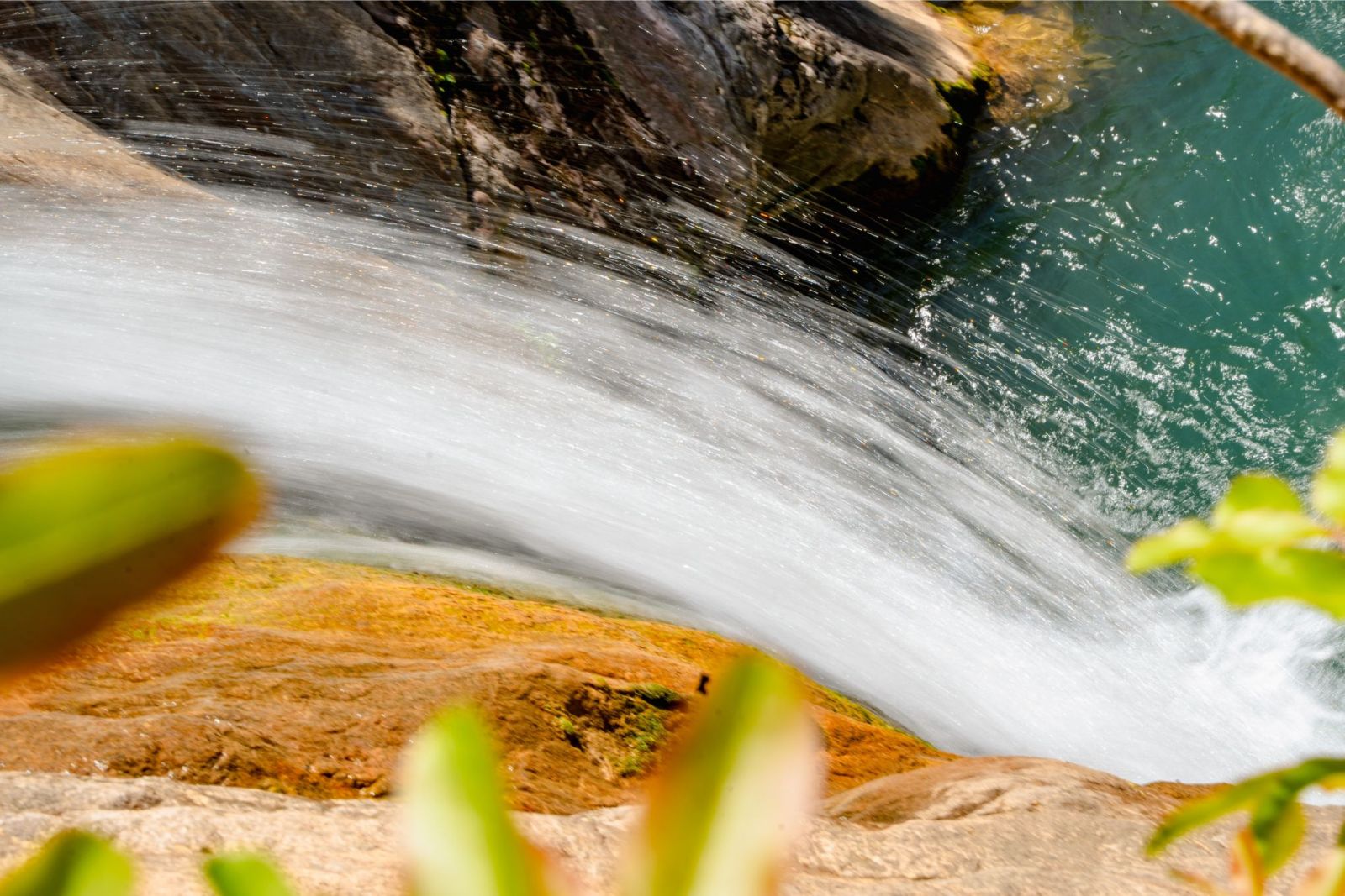 Guest photographed mid-jump in Drenostica Canyon